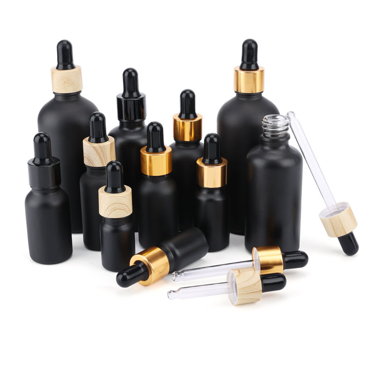 JX Pack 30ml black frosted glass dropper bottles with childproof cap black glass dropper bottles wholesale beard oil essential o