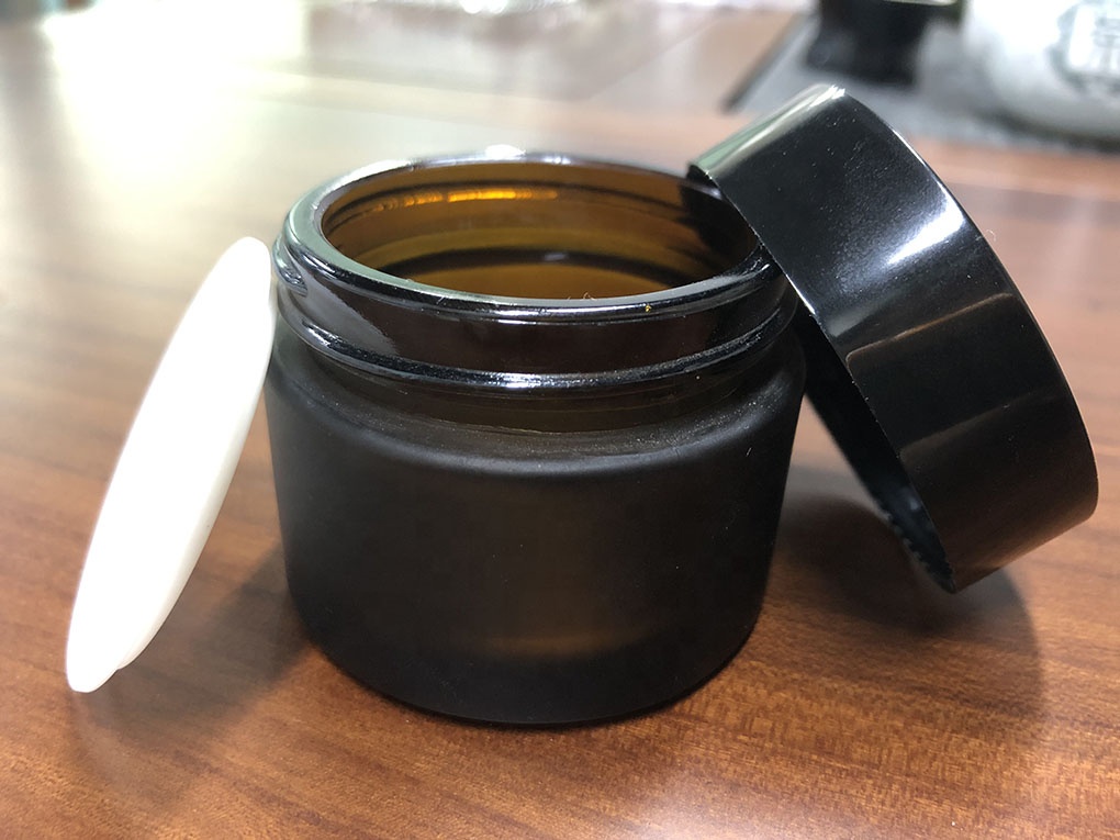 Kangyihong OEM cosmetic 50g cream jar amber glass jar with aluminum screw cap eye hand hair bottle skincare cosmetics empty