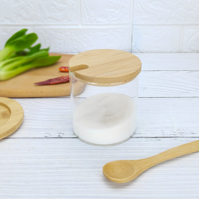 Kitchen spice storage jar set with bamboo tray and wooden spoon