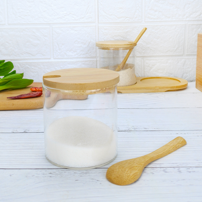 Kitchen spice storage jar set with bamboo tray and wooden spoon