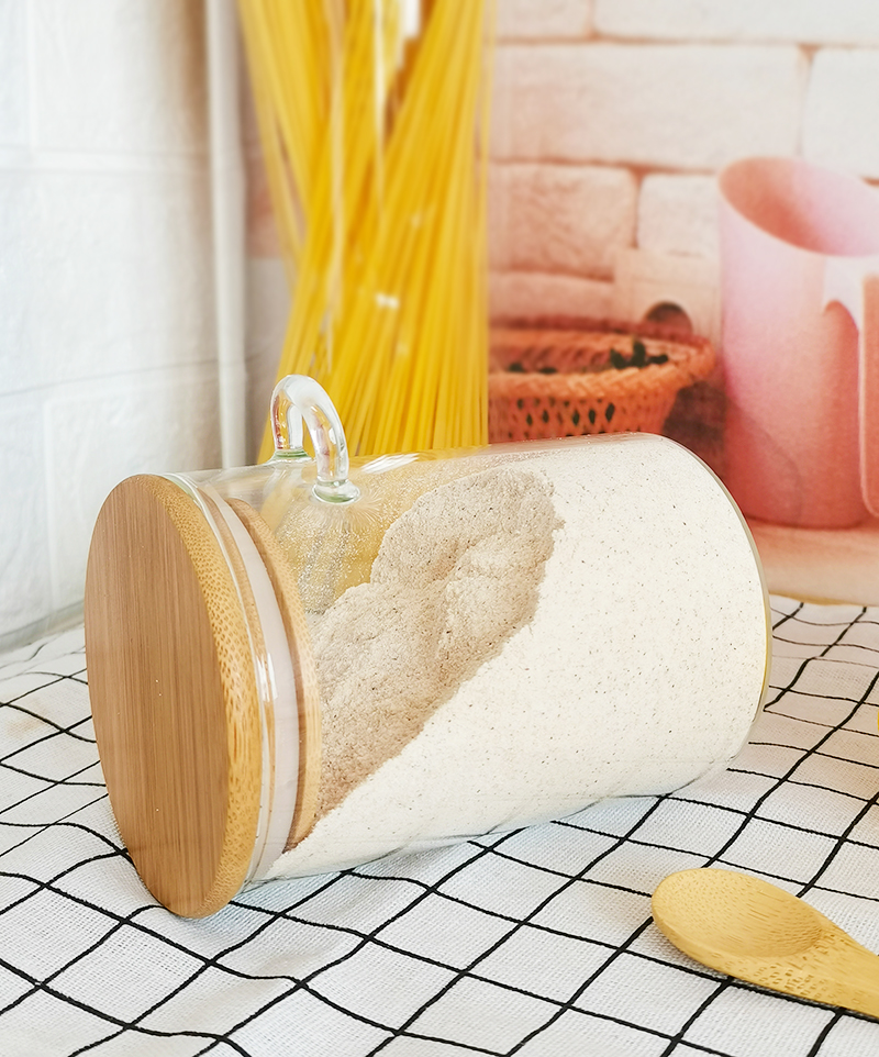 Kitchen storage jar three-piece set with a wooden spoon, a bamboo lid and a glass jar