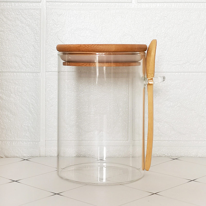 Kitchen storage jar three-piece set with a wooden spoon, a bamboo lid and a glass jar