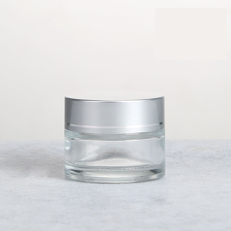LOW MOQ Guangzhou Factory 1OZ 30g Empty Frosted Clear Silver Cap Cosmetics Glass Jar
