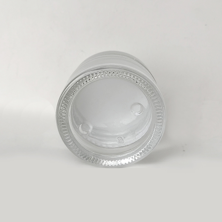 LOW MOQ Guangzhou Factory 1OZ 30g Empty Frosted Clear Silver Cap Cosmetics Glass Jar