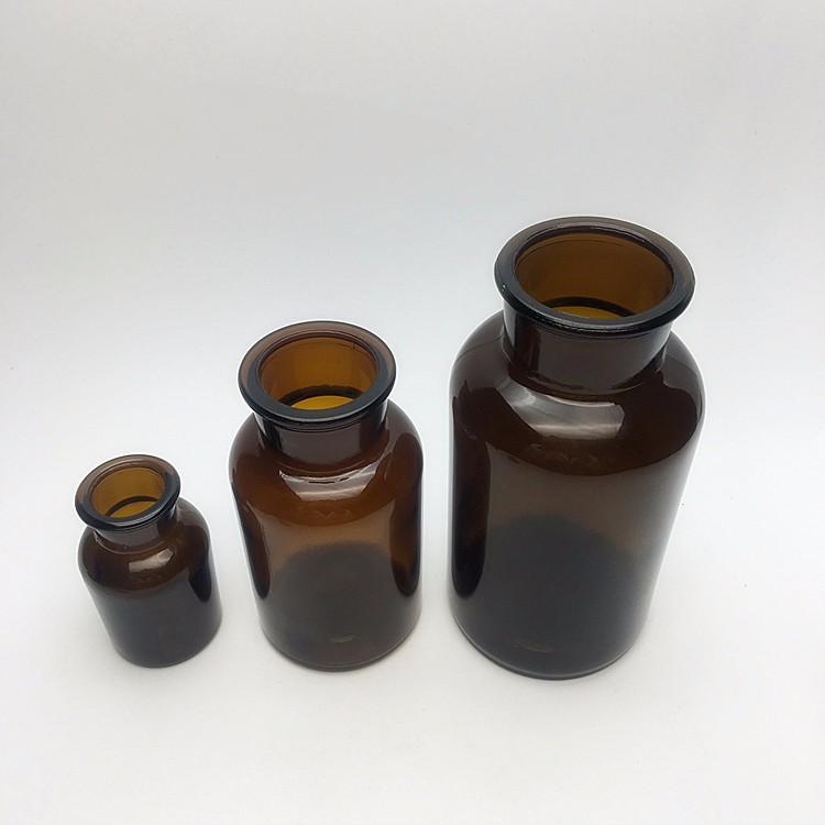 Laboratory amber apothecary medicine pill glass jars with wooden plug 125ml 250ml 500ml