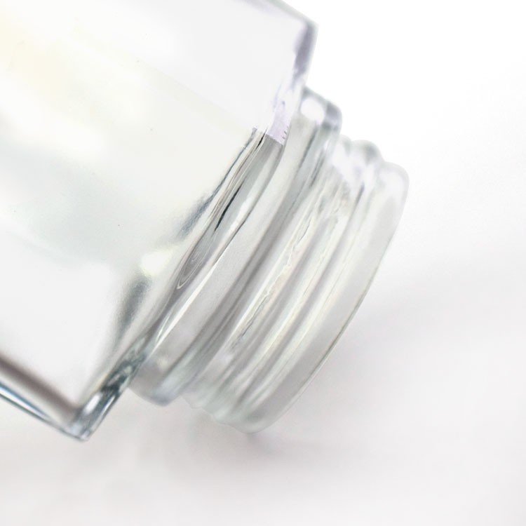 Large stock child resistant clear glass jar with lid