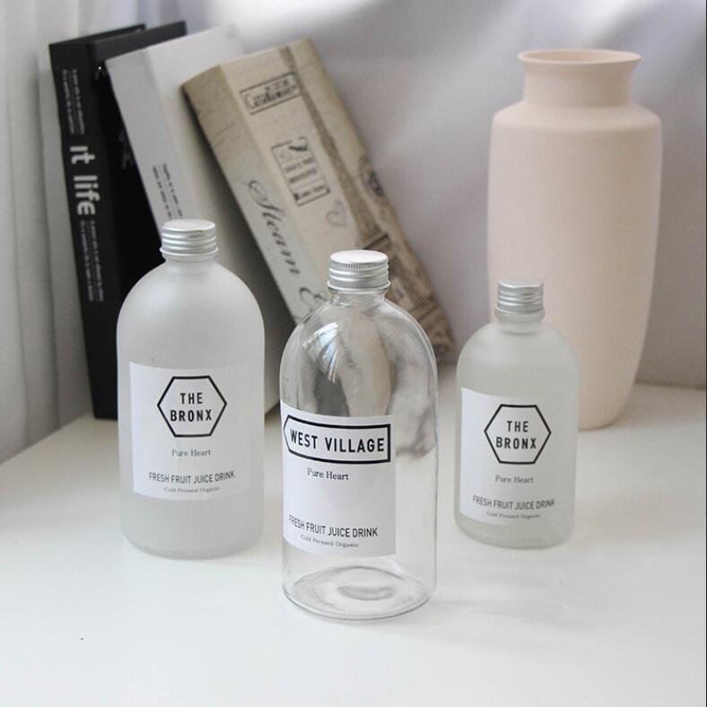 Latest Style Cheap Glass Beverage Bottle for Wholesale with Decal Decorated