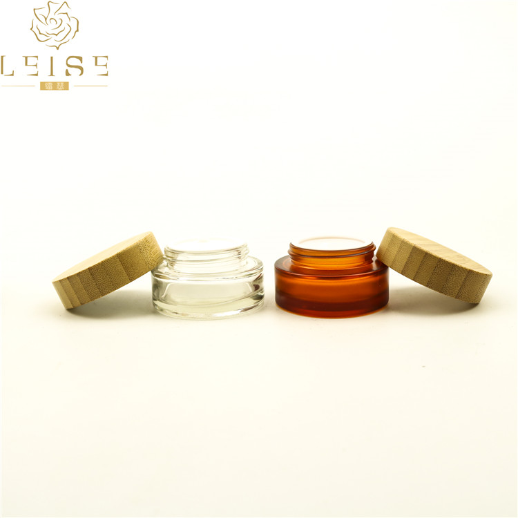 Log wooden bamboo child proof cap 2oz clear child resistant glass jar bamboo candle jar clear glass jar with bamboo lid 1oz 3oz