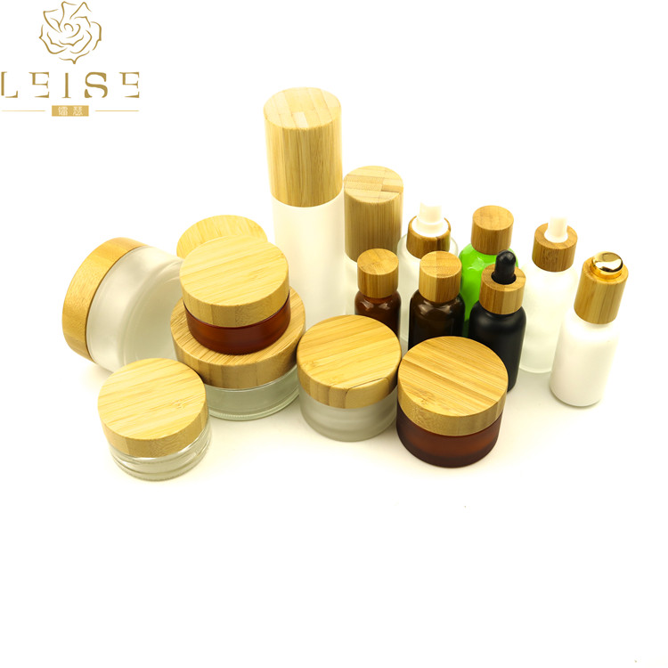 Log wooden bamboo child proof cap 2oz clear child resistant glass jar bamboo candle jar clear glass jar with bamboo lid 1oz 3oz