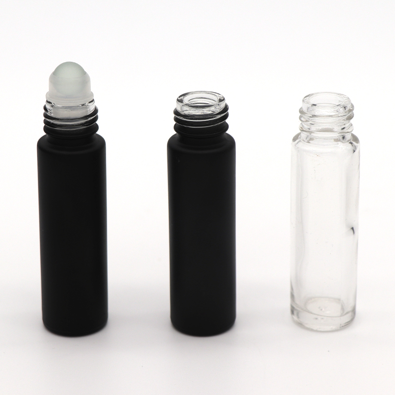 Low MOQ 10ml Perfume Matte Black Clear Glass Roller essential Oil Bottles with lid
