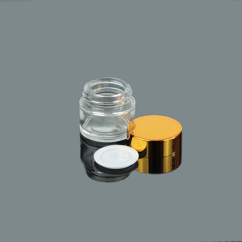 Low MOQ Mini Clear Cream 10g 10ml Round Bottom Glass Jar With UV Gold Lid (GJM04)
