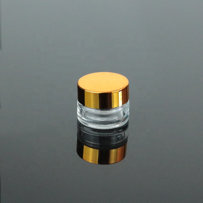 Low MOQ Mini Clear Cream 10g 10ml Round Bottom Glass Jar With UV Gold Lid (GJM04)