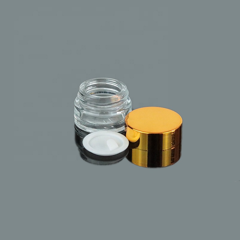 Low MOQ Mini Clear Cream 10g 10ml Round Bottom Glass Jar With UV Gold Lid (GJM04)