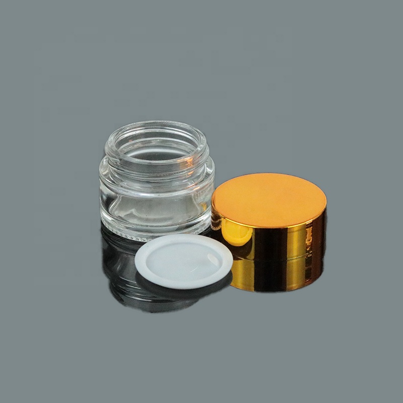 Low MOQ Mini Clear Cream 10g 10ml Round Bottom Glass Jar With UV Gold Lid (GJM04)