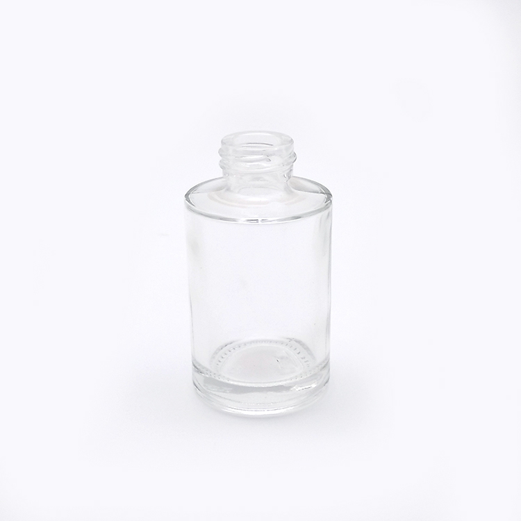 Low MOQ empty cosmetic clear amber glass serum glass dropper bottle 30ml