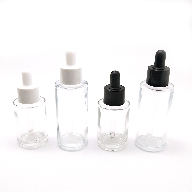 Low MOQ empty cosmetic clear amber glass serum glass dropper bottle 30ml