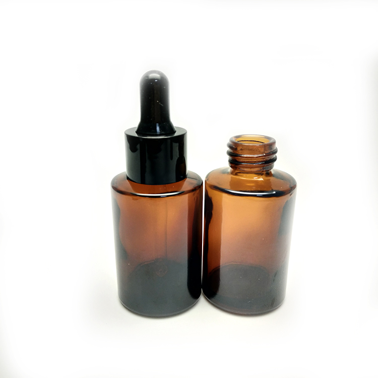 Low MOQ empty cosmetic clear amber glass serum glass dropper bottle 30ml