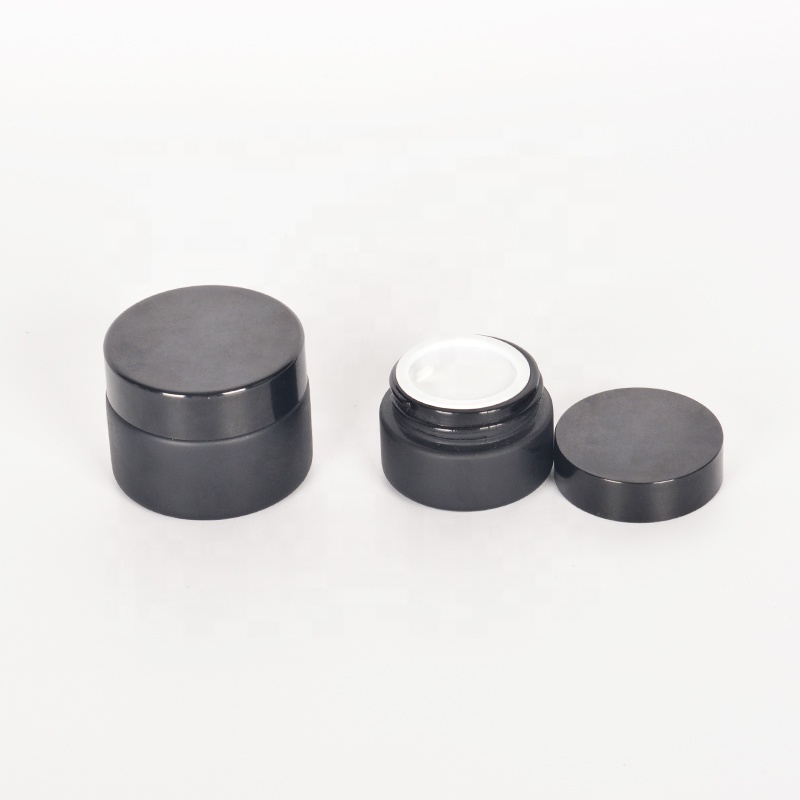 Low MOQ matte black glass jars with PP ABS aluminum cap in stock black glass cosmetic jar