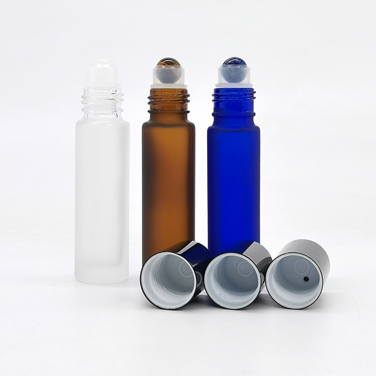 Low MOQ roll on bottles 10ml black amber blue clear roller bottle with stainless steel roller ball