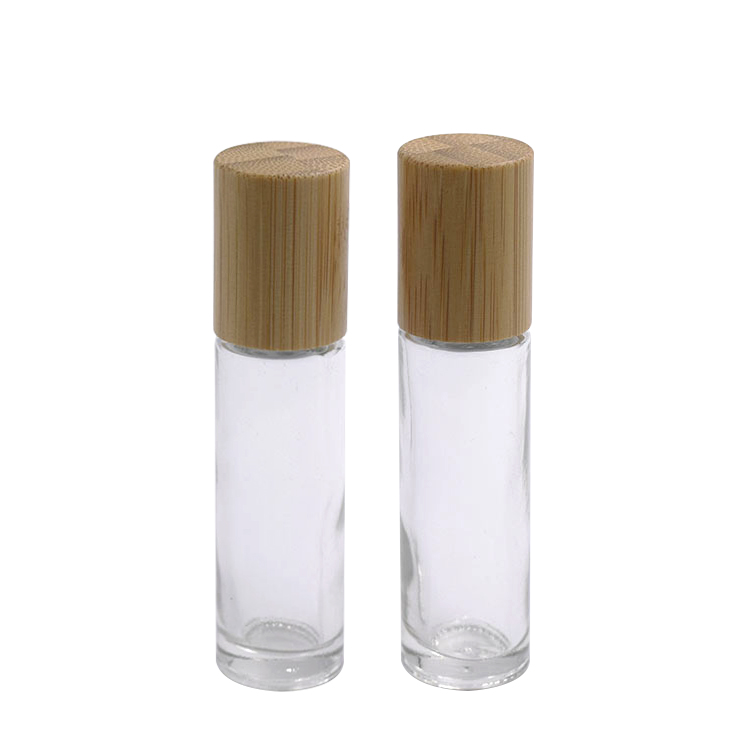 Low MOQ skin care 10ml 15ml clear glass roll bottle with bamboo lid in stock