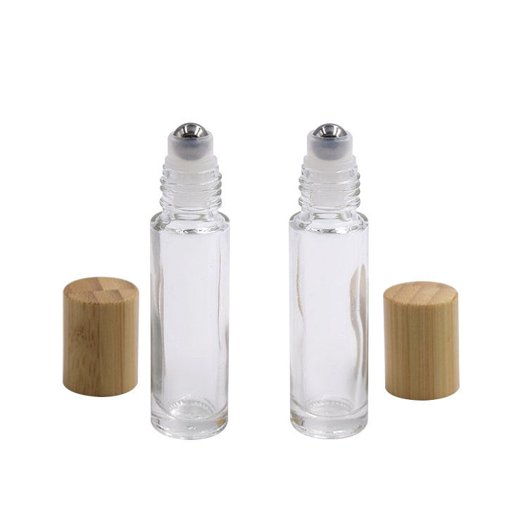 Low MOQ skin care 10ml 15ml clear glass roll bottle with bamboo lid in stock