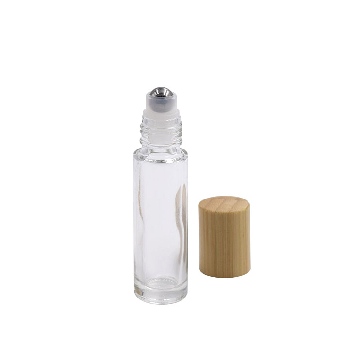 Low MOQ skin care 10ml 15ml clear glass roll bottle with bamboo lid in stock