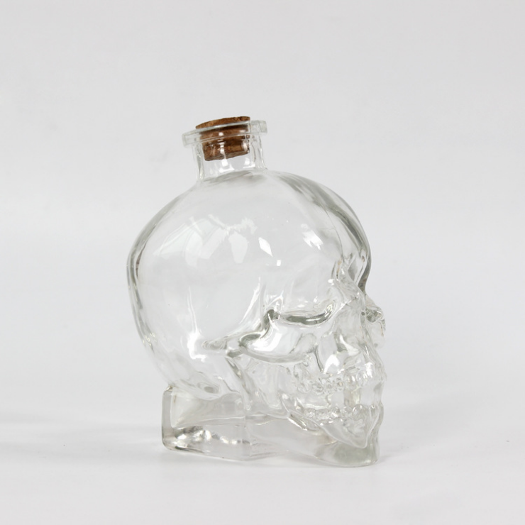 Low Price Wholesale 100ml 180ml 400ml 750ml Clear Skull Shaped Empty Red Wine Glass Bottles Whisky Bottles