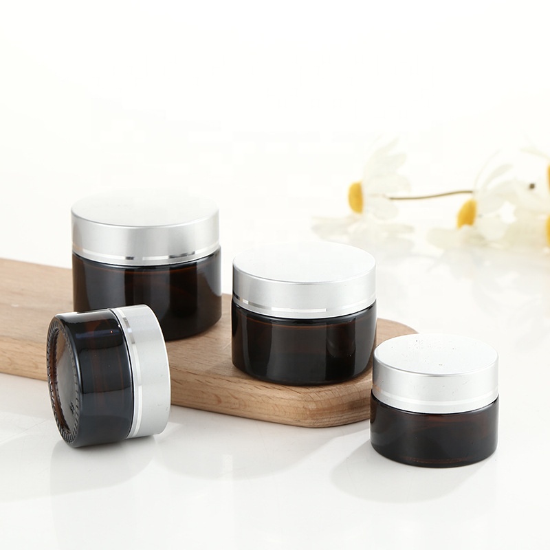 Low moq 50g brown glass face cream jar with lid cylinder airtight cosmetic packaging jar
