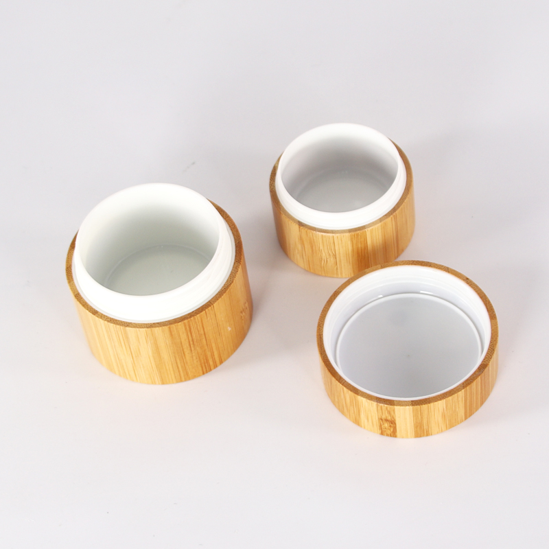 Low moq 50g glass face cream jar with bamboo lid Cylinder airtight cosmetic packaging jar