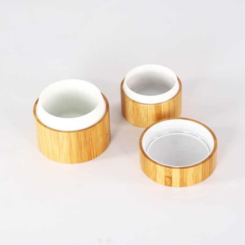 Low moq 50g glass face cream jar with bamboo lid Cylinder airtight cosmetic packaging jar