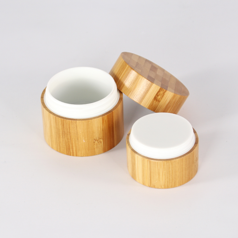 Low moq 50g glass face cream jar with bamboo lid Cylinder airtight cosmetic packaging jar