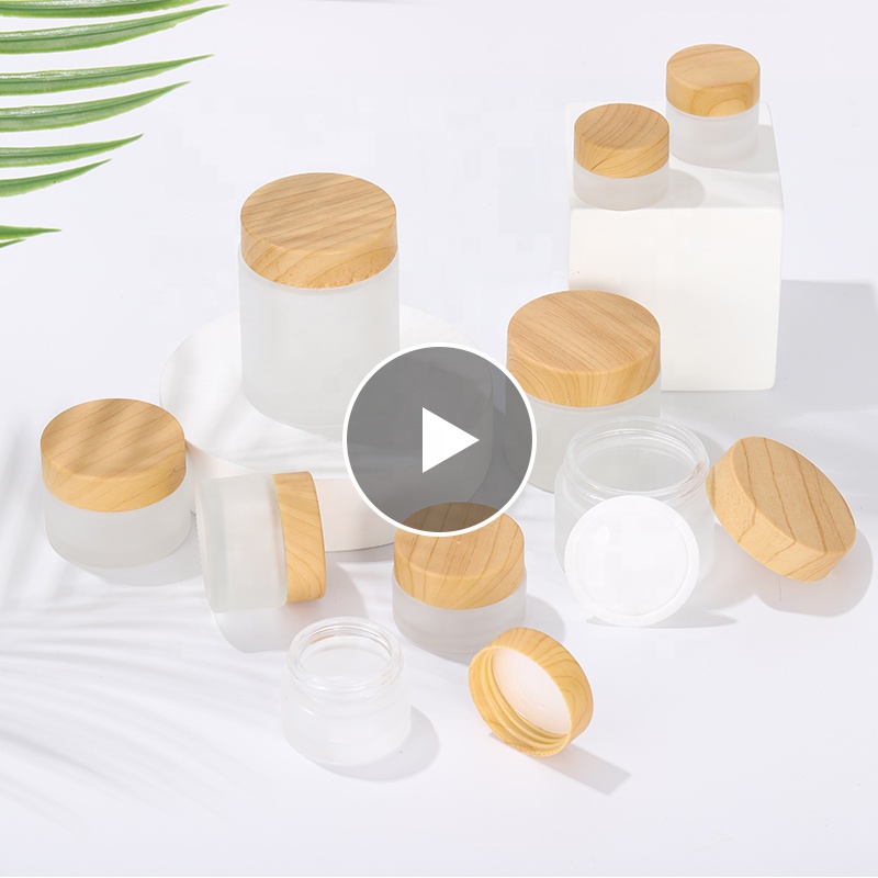 Low moq 50g transparent matte glass face cream jar with bamboo lid Cylinder airtight cosmetic packaging jar