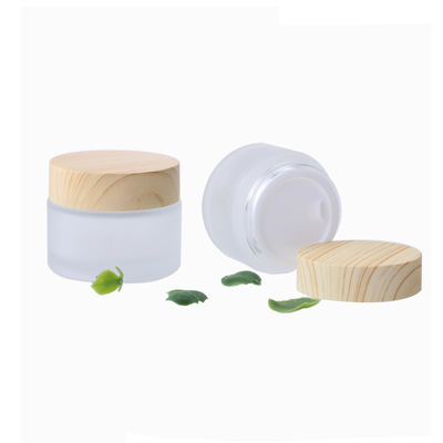 Low moq 50g transparent matte glass face cream jar with bamboo lid Cylinder airtight cosmetic packaging jar