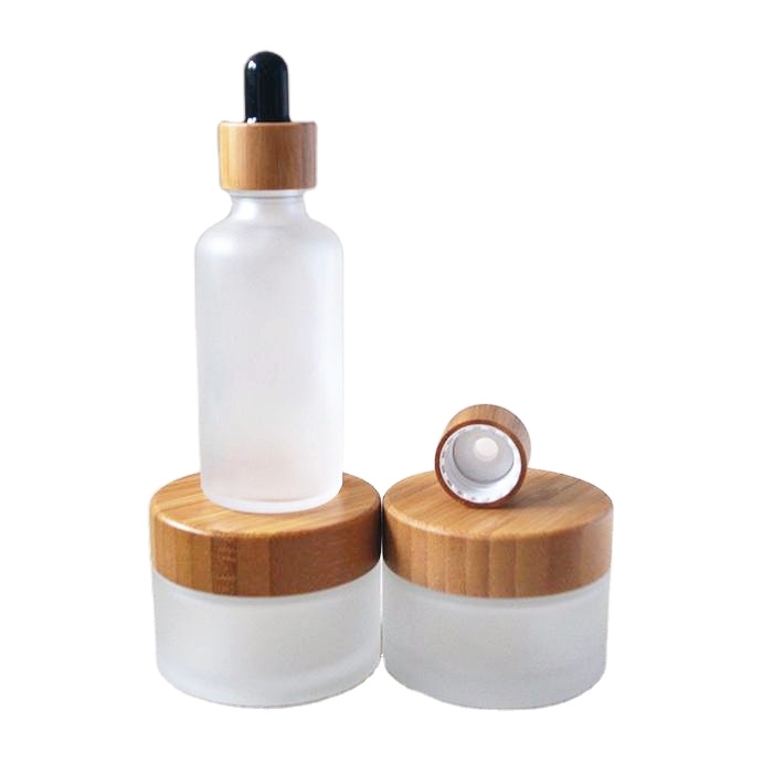 Lower Price 5g 10g 15g 30g 50g 100g Custom Glass Black Amber White Clear Frosted Jars With Bamboo Screw Lid