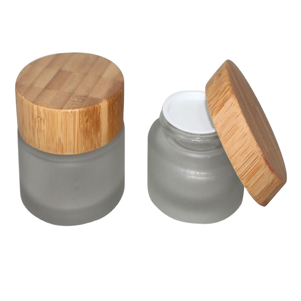 Lower Price 5g 10g 15g 30g 50g 100g Custom Glass Black Amber White Clear Frosted Jars With Bamboo Screw Lid