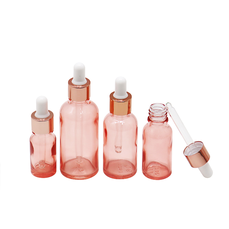 Luxury 0.5oz 1oz 2 oz 10ml 15ml 20ml 30ml 50ml 100ml pink essential oil facial serum glass dropper bottle with rose gold caps