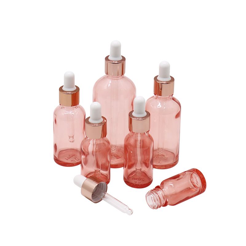 Luxury 0.5oz 1oz 2 oz 10ml 15ml 20ml 30ml 50ml 100ml pink essential oil facial serum glass dropper bottle with rose gold caps