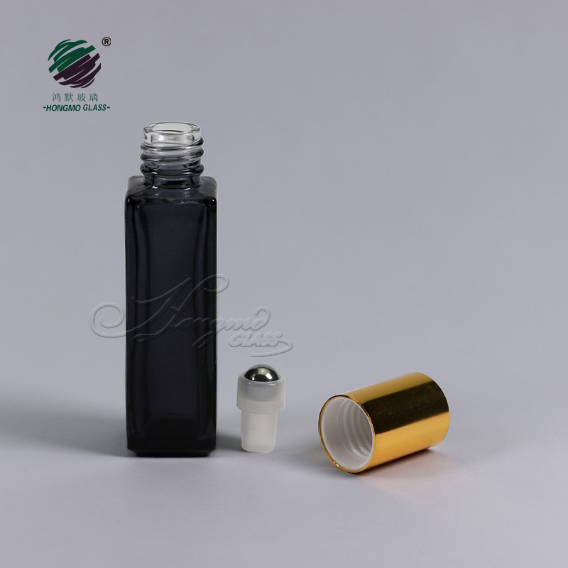 Luxury 10ml 10 ml 1/3 oz clear black square roll on perfume glass bottle with metal roller for essential oil