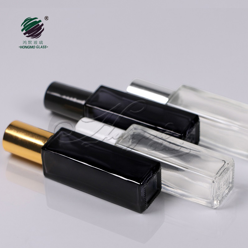 Luxury 10ml 10 ml 1/3 oz clear black square roll on perfume glass bottle with metal roller for essential oil