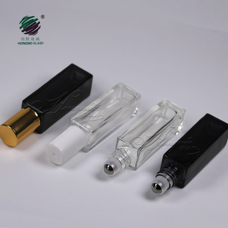 Luxury 10ml 10 ml 1/3 oz clear black square roll on perfume glass bottle with metal roller for essential oil