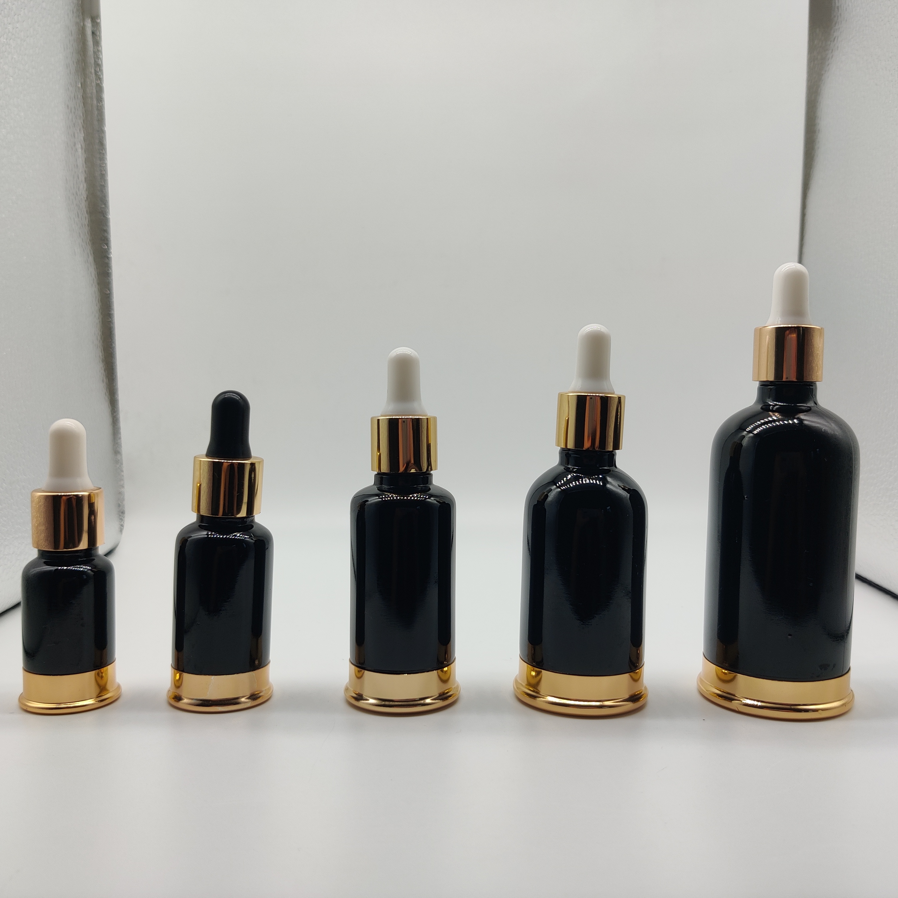 Luxury 10ml-100ml Black Jade Glass Bottle with Gold for Essential oil Serum Balm with Gold Dropper