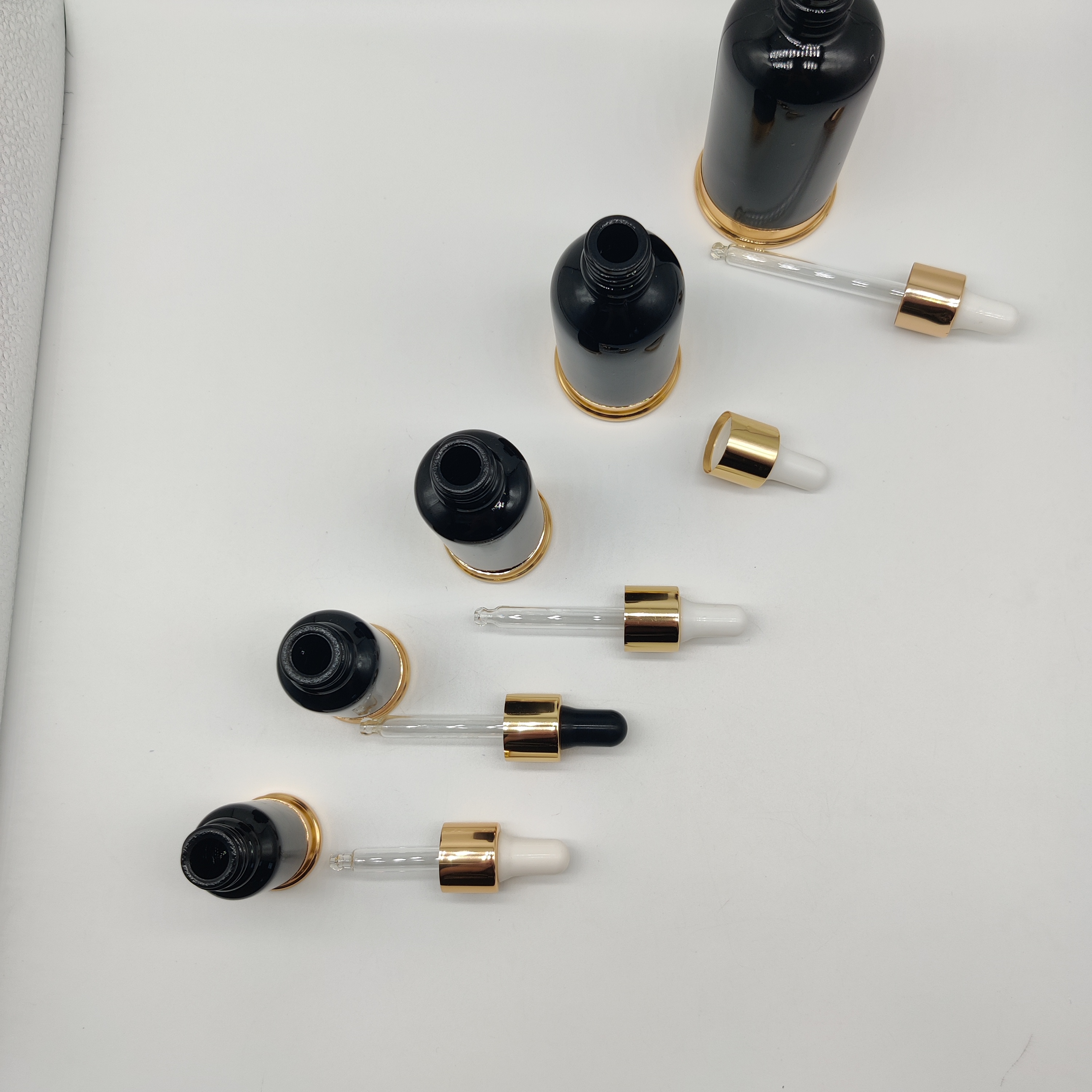 Luxury 10ml-100ml Black Jade Glass Bottle with Gold for Essential oil Serum Balm with Gold Dropper