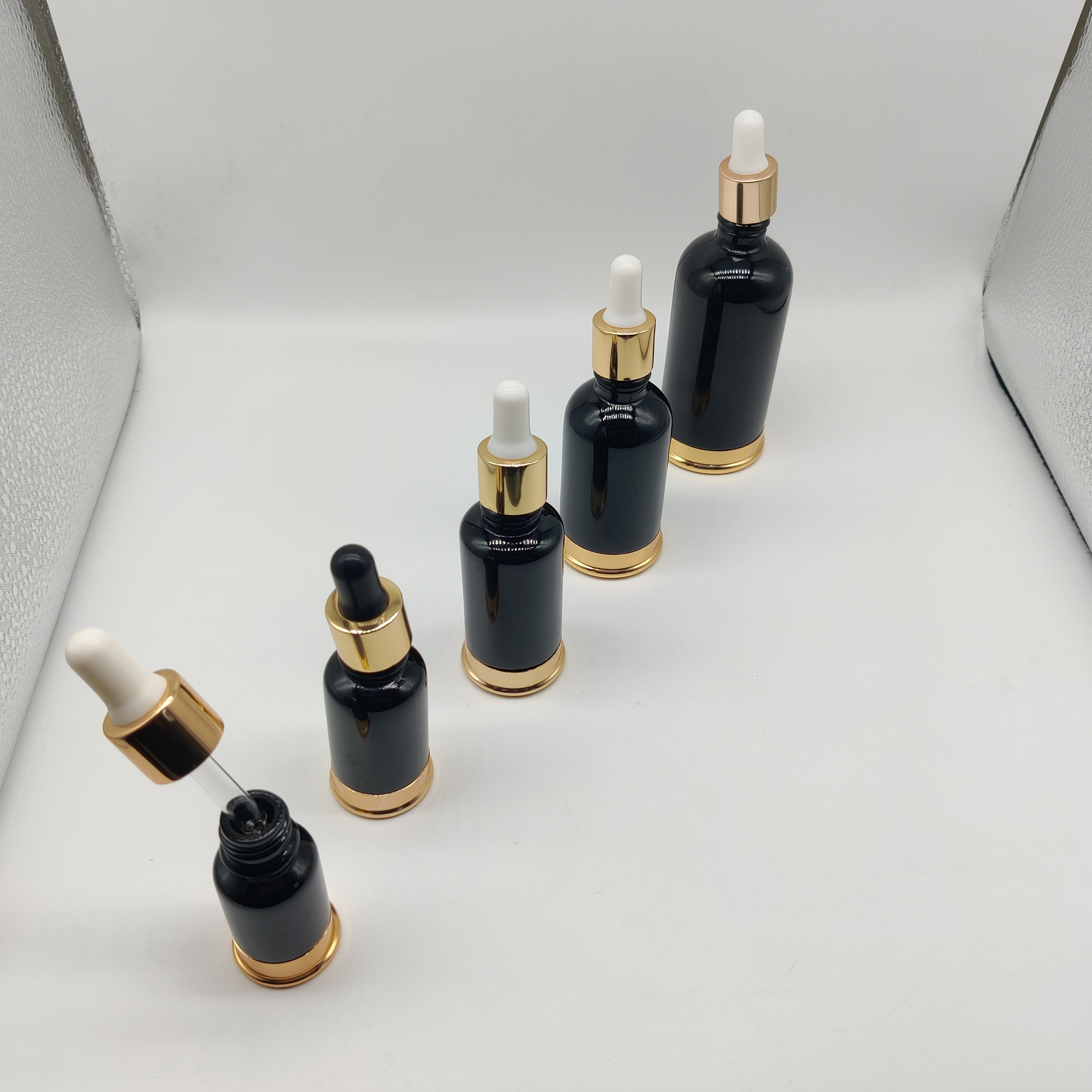 Luxury 10ml-100ml Black Jade Glass Bottle with Gold for Essential oil Serum Balm with Gold Dropper