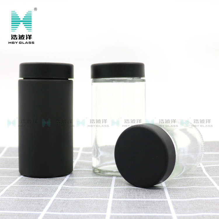 Luxury 120ml matte black cylinder cream child resistant glass jar with plastic screw lid