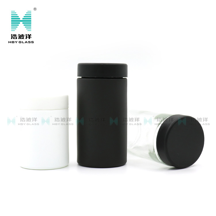 Luxury 120ml matte black cylinder cream child resistant glass jar with plastic screw lid
