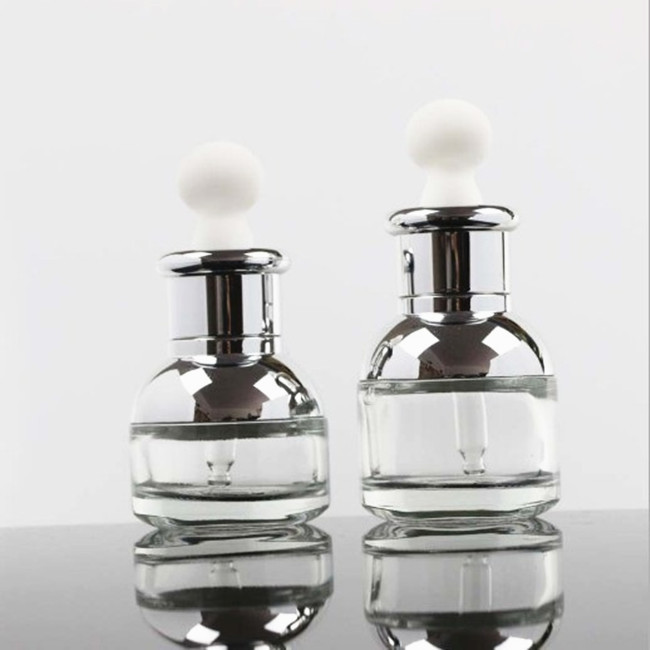 Luxury 20 ML 30 ML Short type empty skin care glass dropper bottle for essence with golden/silver shoulder and dropper cap