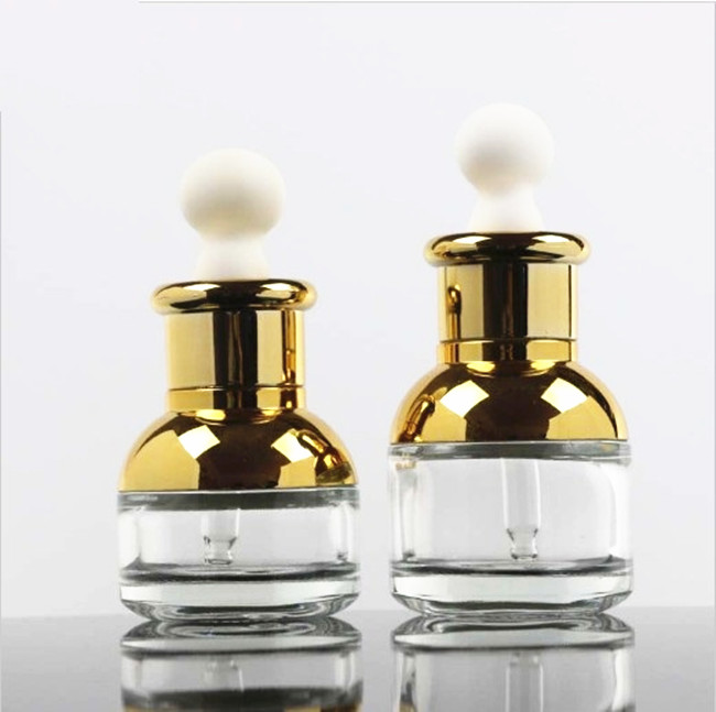 Luxury 20 ML 30 ML Short type empty skin care glass dropper bottle for essence with golden/silver shoulder and dropper cap