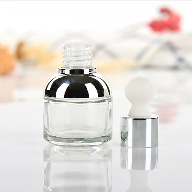 Luxury 20 ML 30 ML Short type empty skin care glass dropper bottle for essence with golden/silver shoulder and dropper cap