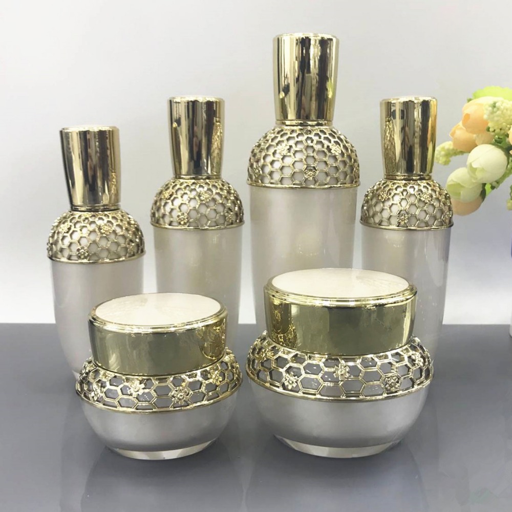 Luxury 30g 50ml 80ml 100ml gold color body acrylic lotion pump bottle face cream jars skin care round bottle set squeeze bottle