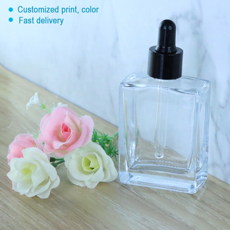 Luxury 30ml 50ml 100ml Square Clear Cosmetic Serum Glass Dropper Bottle for Essential Oil (GSA21)